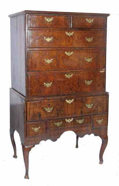 Appraisal: A GEORGE II GEORGE III WALNUT CHEST ON STAND the