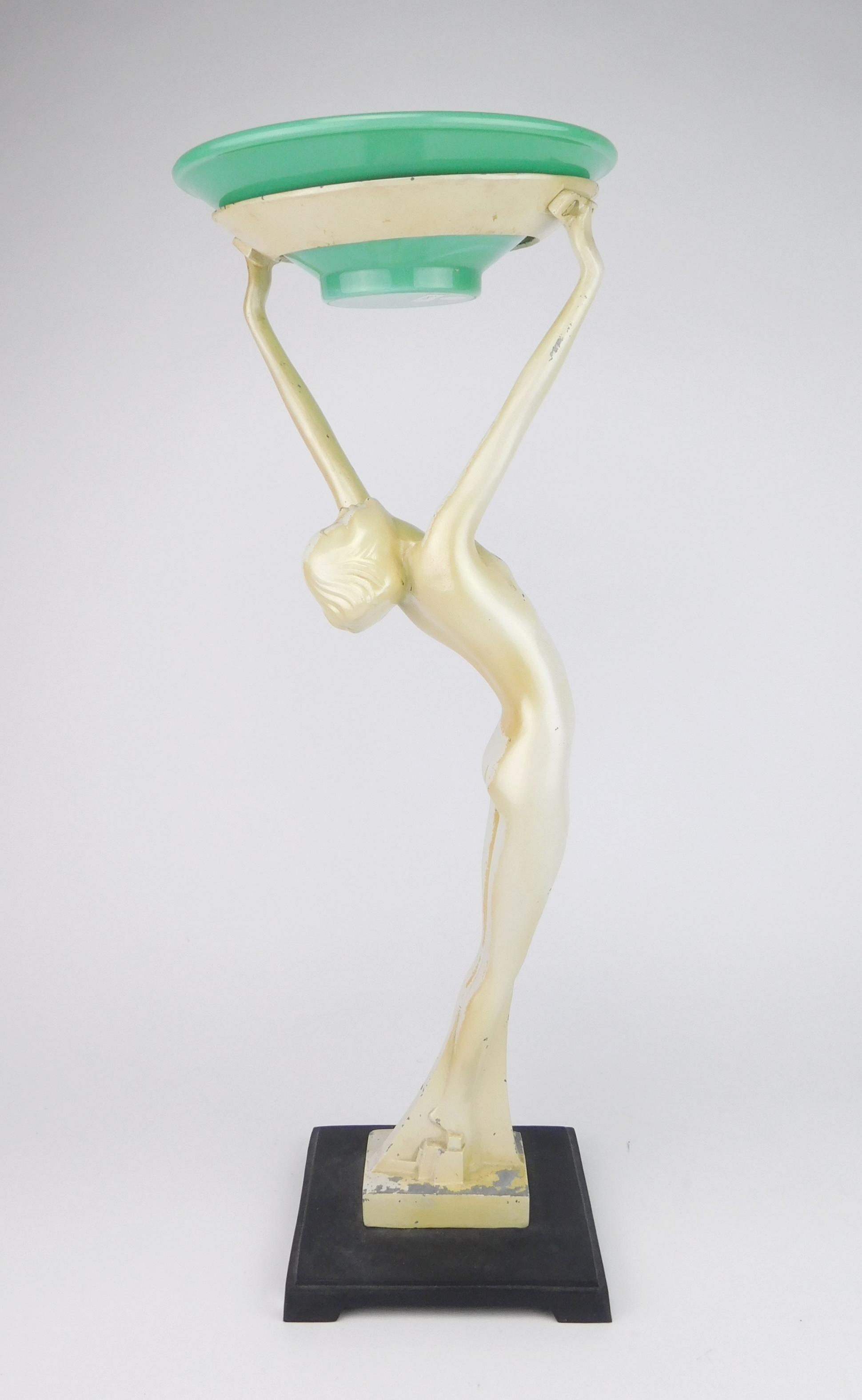 Appraisal: Frankart Quoizel pearlized ivory ''Alien'' style girl floor ashtray model