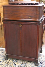 Appraisal: REGINAPHONE MUSIC BOX ON CABINET FLOOR STAND WITH DISCS the