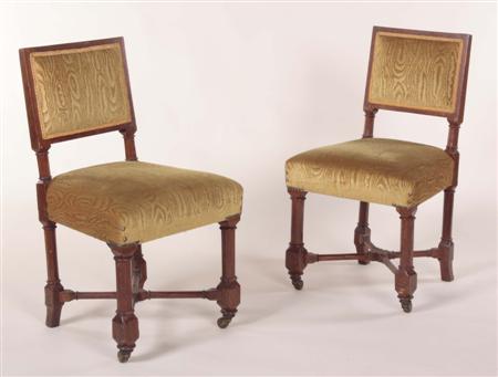 Appraisal: A set of fourteen oak Gothic Revival chairs each with