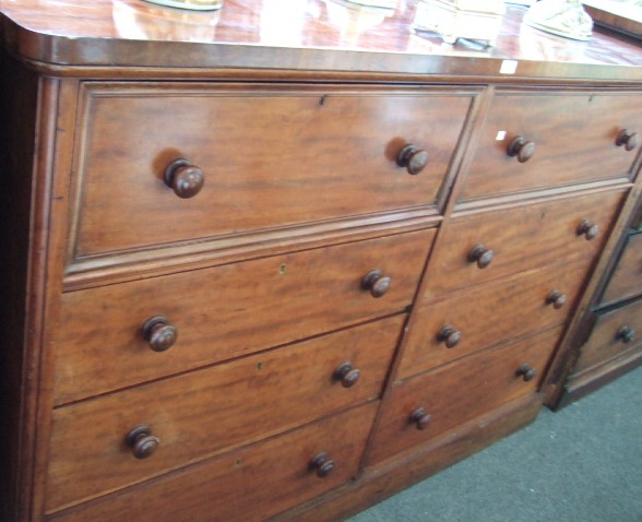 Appraisal: An early Victorian mahogany chest with two hinged faux drawer