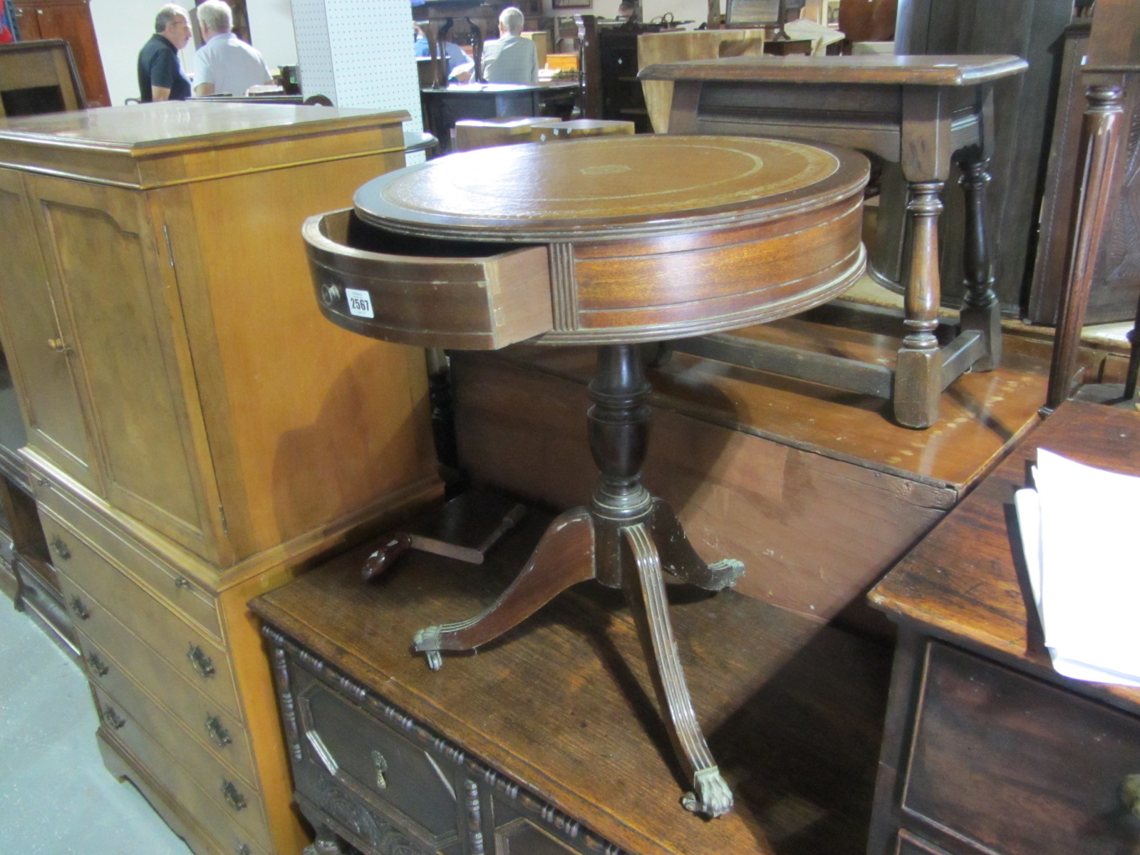 Appraisal: A th century mahogany circular drum table