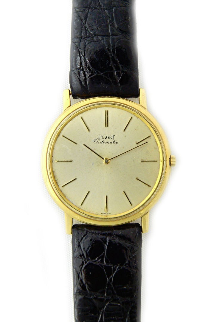 Appraisal: A gentleman's gold circular cased Piaget Automatic wristwatch the signed