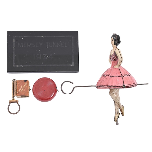 Appraisal: A lithographed tinplate friction powered dancing ballerina toy c a