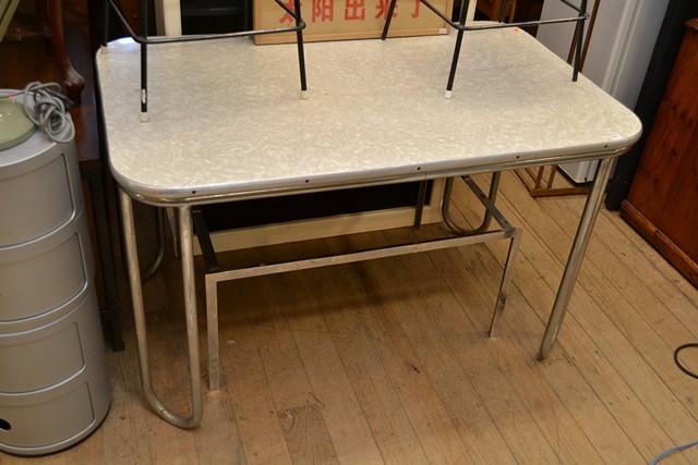 Appraisal: A RETRO LAMINATE TOP TABLE ON CHROME BASE A RETRO