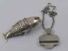 Appraisal: An articulated fish in white metal tests silver opening at