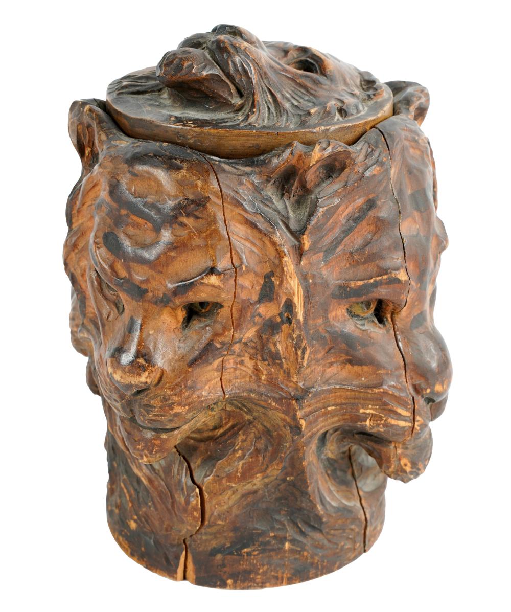 Appraisal: CONTINENTAL CARVED WOOD HUMIDORwith lion motif to each side and