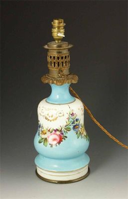 Appraisal: A French opaque glass table lamp painted with flowers originally