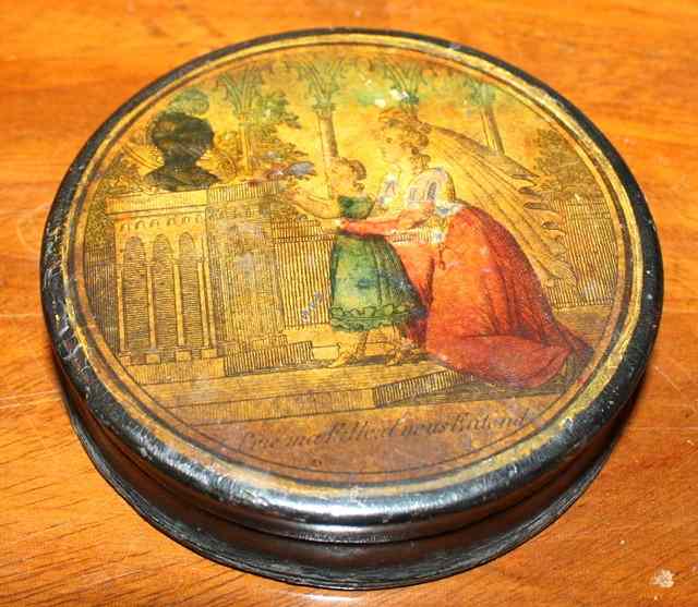 Appraisal: A FRENCH PAPIER MACH CIRCULAR SNUFF BOX with an over