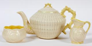 Appraisal: BELLEEK PORCELAIN TEAPOT CREAMER SUGAR BOWL BELLEEK 'LIMPET' 'SHELL' PORCELAIN