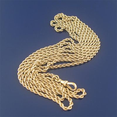 Appraisal: A ct gold twisted rope link long guard chain grams