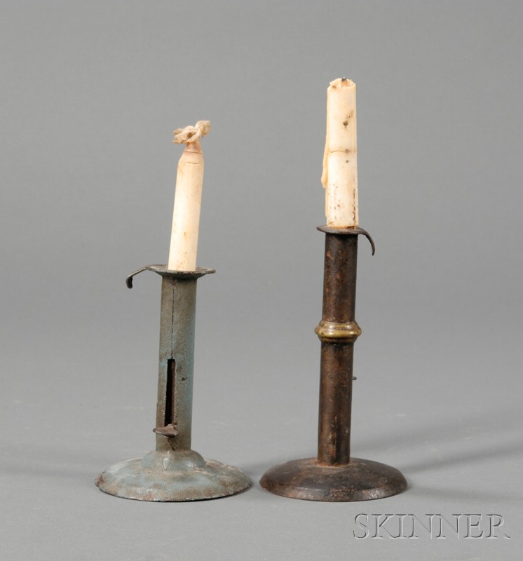 Appraisal: Two Iron Hogscraper-form Candlesticks America early th century one painted