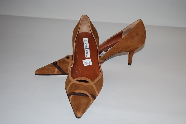 Appraisal: Christian Lacroit suede tan pumps with brown cut-out on toe