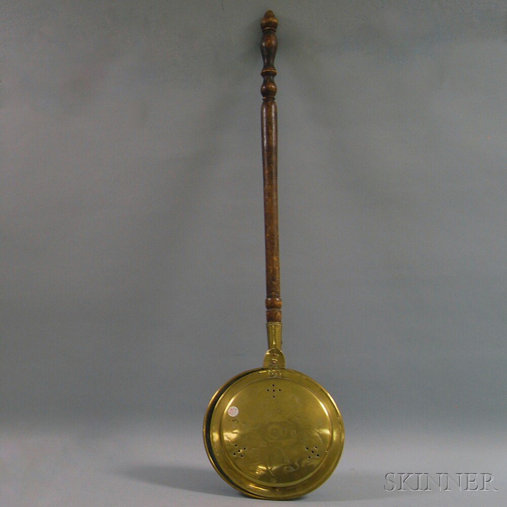 Appraisal: Engraved Brass Bedwarmer with Turned Wooden Handle th century lg