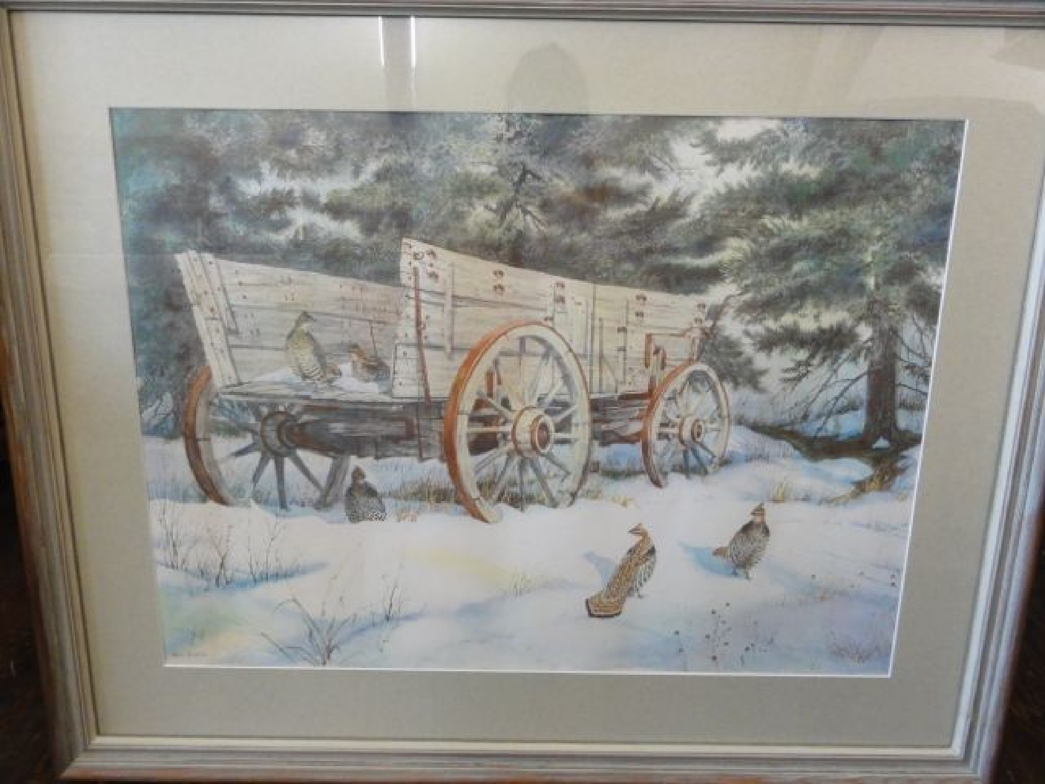 Appraisal: A large coloured print of a winter scene with partridges