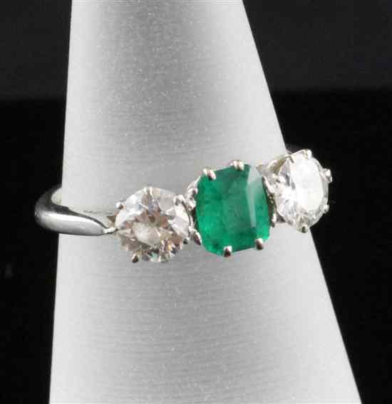 Appraisal: A platinum set three stone emerald and diamond ring total