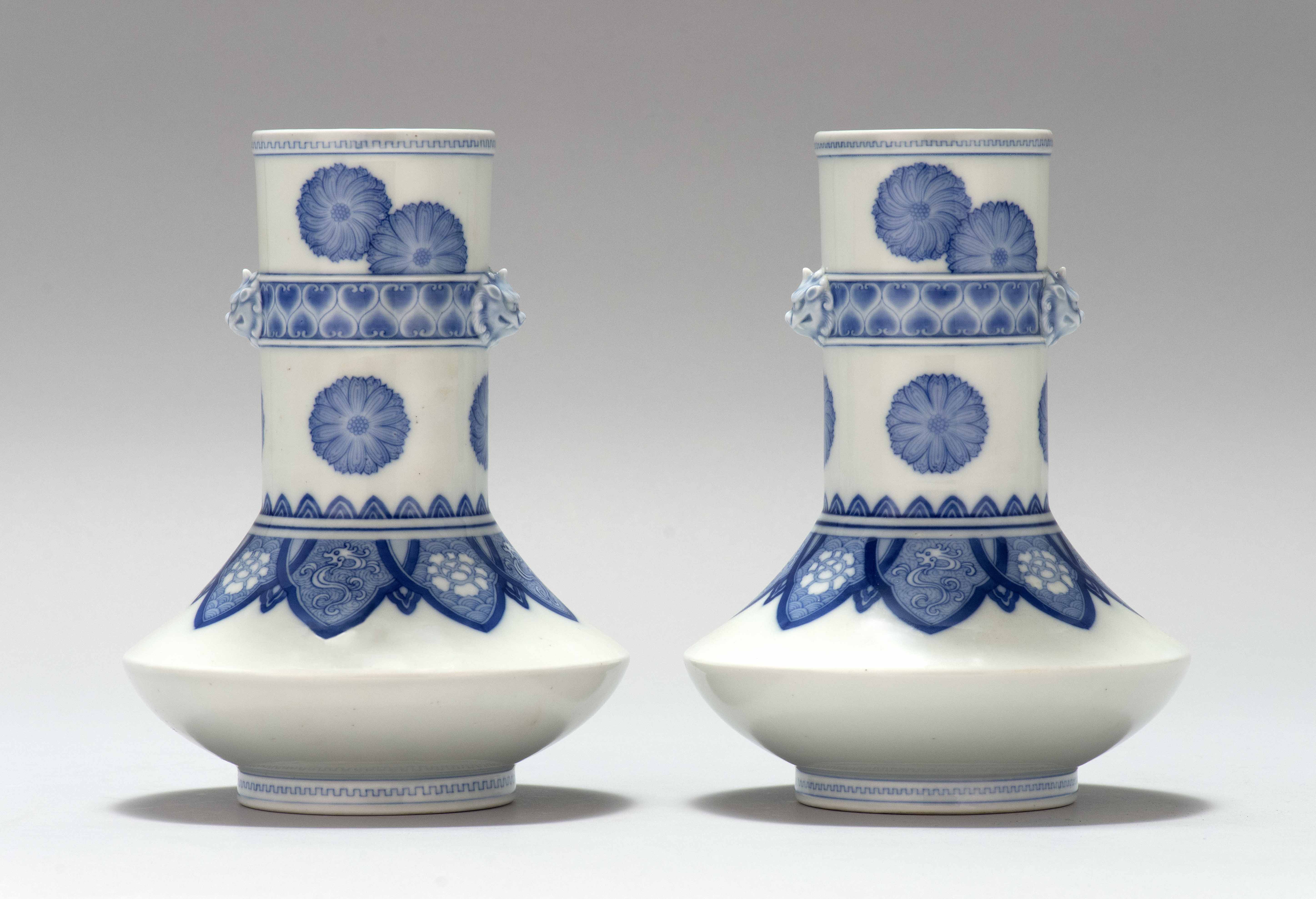 Appraisal: PAIR OF HIRADO PORCELAIN VASES Meiji PeriodIn squat ovoid form