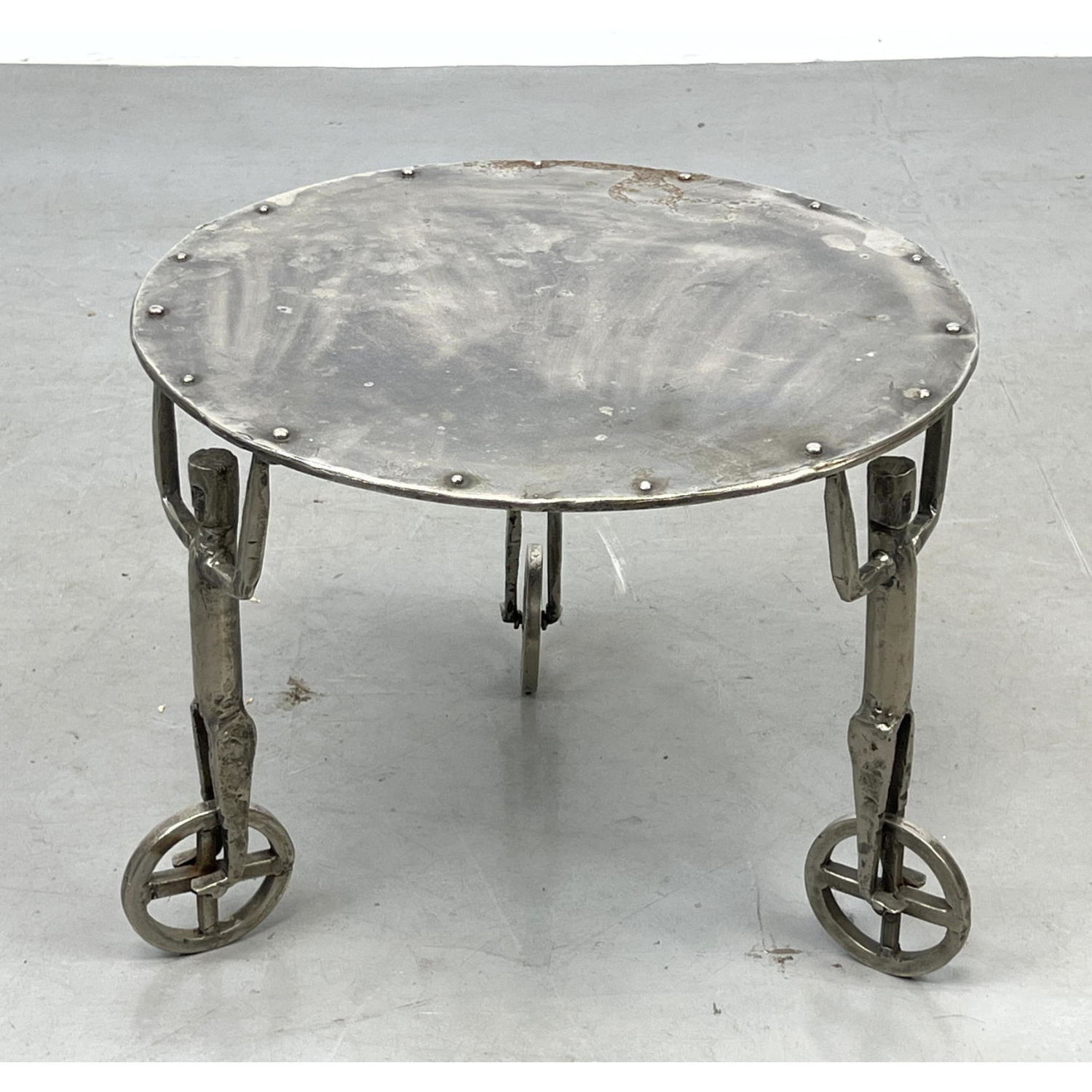 Appraisal: s Artisan Whimsical Figural Steel Side Table Human Figures on