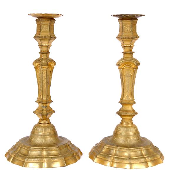 Appraisal: A pair of gilt brass candlesticks together with two cut