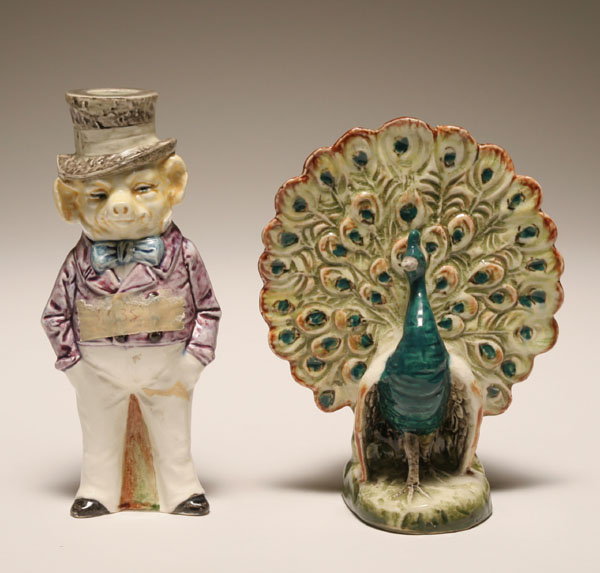 Appraisal: Figural majolica peacock planter and pig candlestick swine in tophat