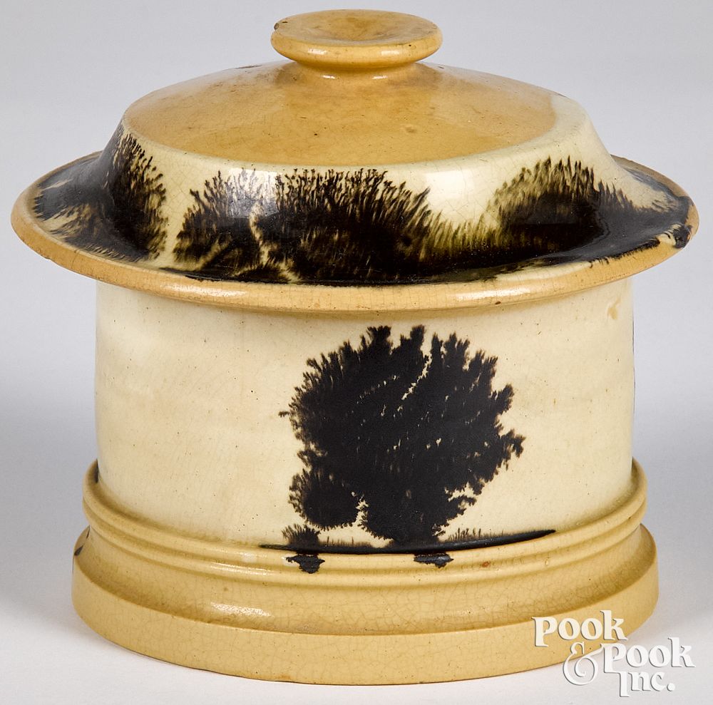 Appraisal: Yellowware lidded canister Yellowware lidded canister with mocha seaweed decoration