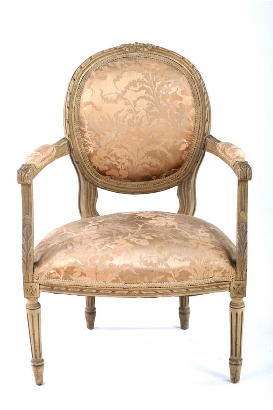 Appraisal: PAINTED LOUIS XVI STYLE MEDALLION-BACK FAUTEUIL th century Bow-knotted crest