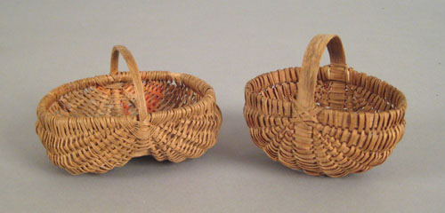 Appraisal: Two miniature splint oak buttocks baskets th c h w