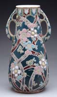 Appraisal: DOUBLE HANDLED SATSUMA VASE Enamel decorated with oval scene of