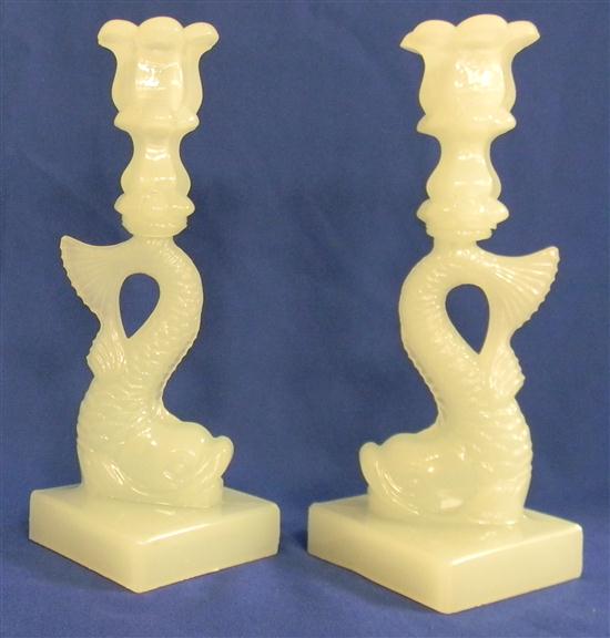 Appraisal: Pair of Boston Sandwich Glass Company clambroth dolphin candlesticks ''