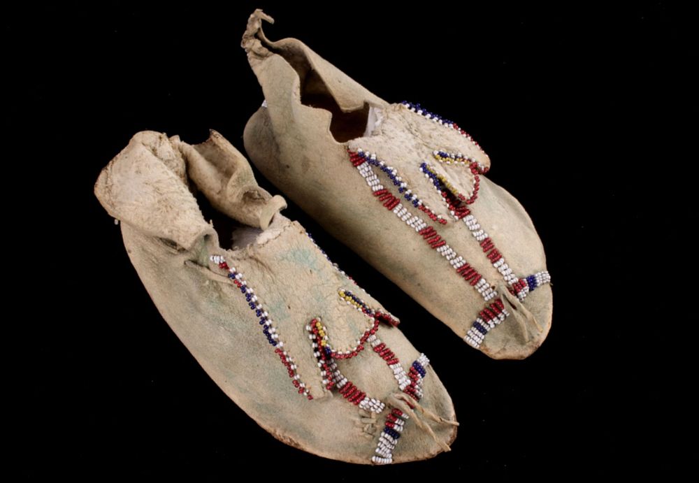 Appraisal: Apache Trifurcated Tongue Beaded Moccasins The lot features a set