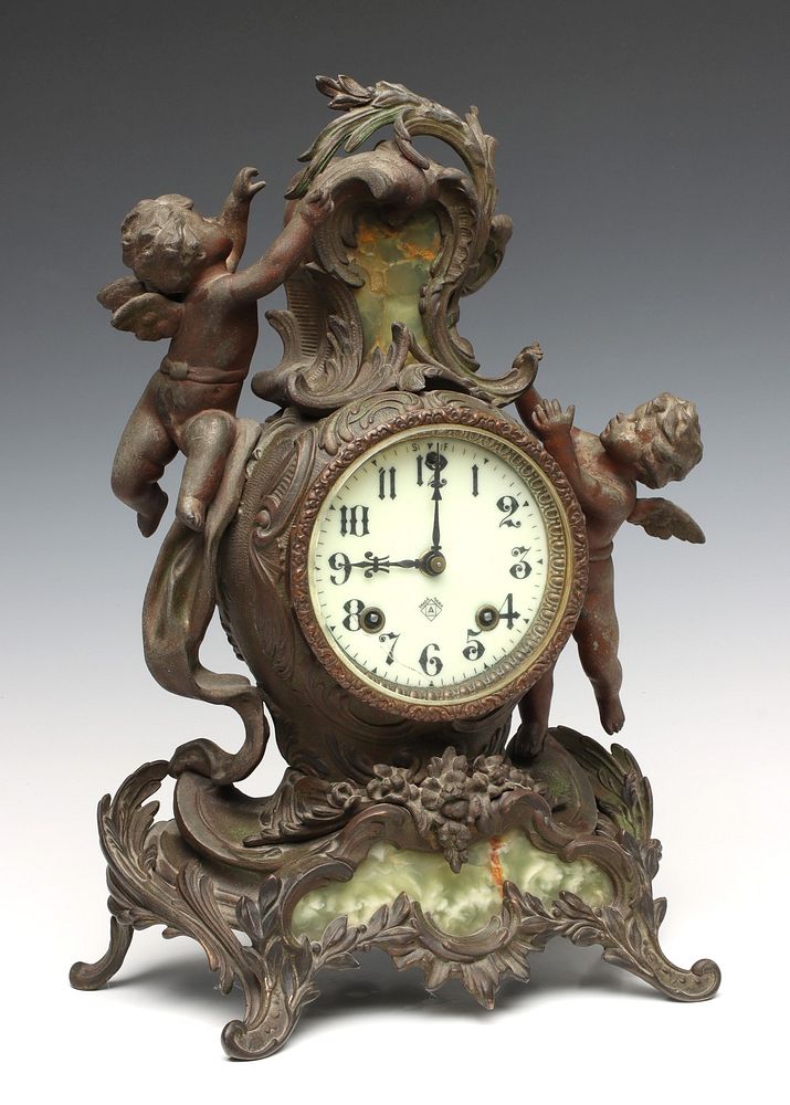 Appraisal: A FRENCH ROCOCO STYLE ANSONIA CLOCK WITH GREEN ONYX The