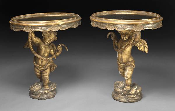 Appraisal: A pair of Italian Rococo style carved giltwood tables incorporating