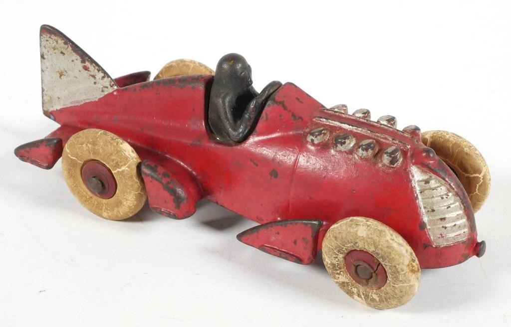 Appraisal: ANTIQUE HUBLEY CAST IRON RACER W DRIVERHubley Cast Iron Fish