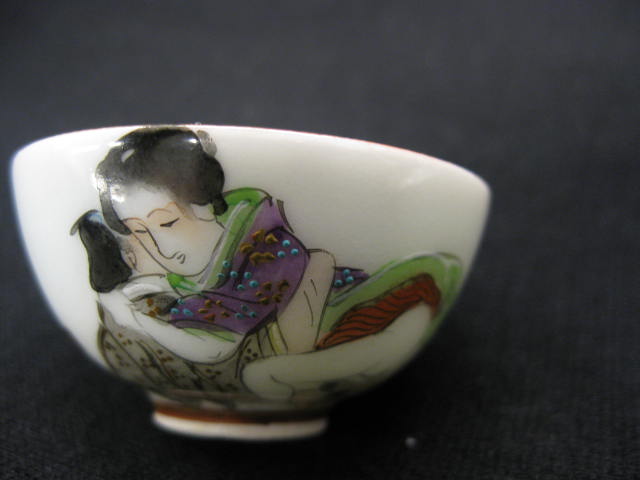 Appraisal: Japanese Erotic Porcelain Miniature Bowl floral interior with calligraphy couple