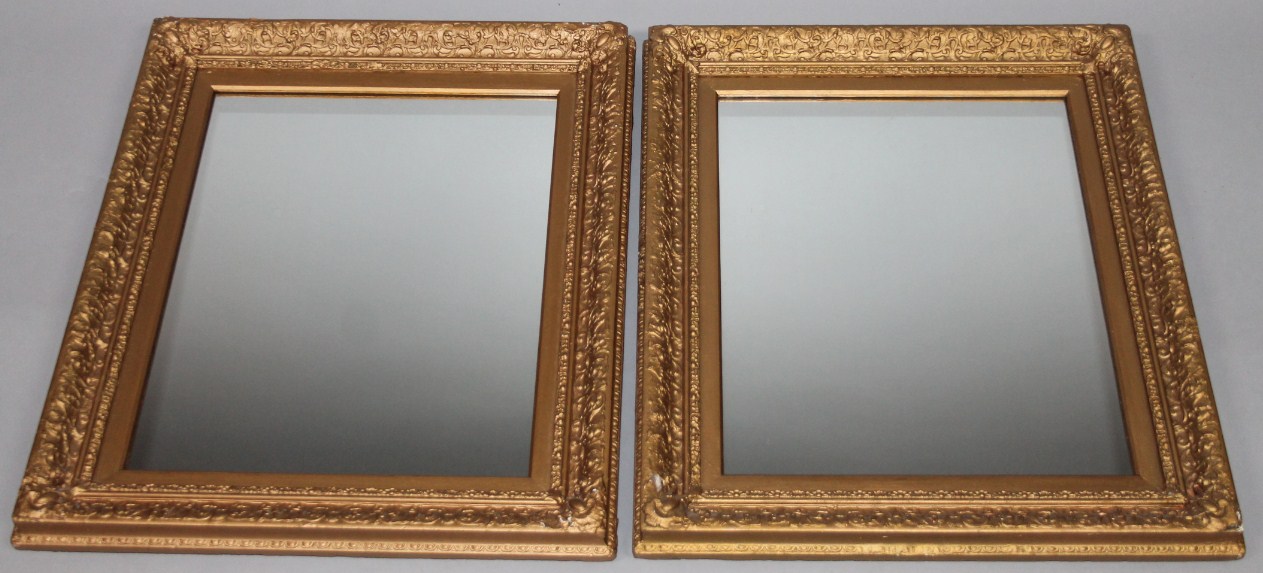 Appraisal: A pair of wall mirrors each each with a gilt