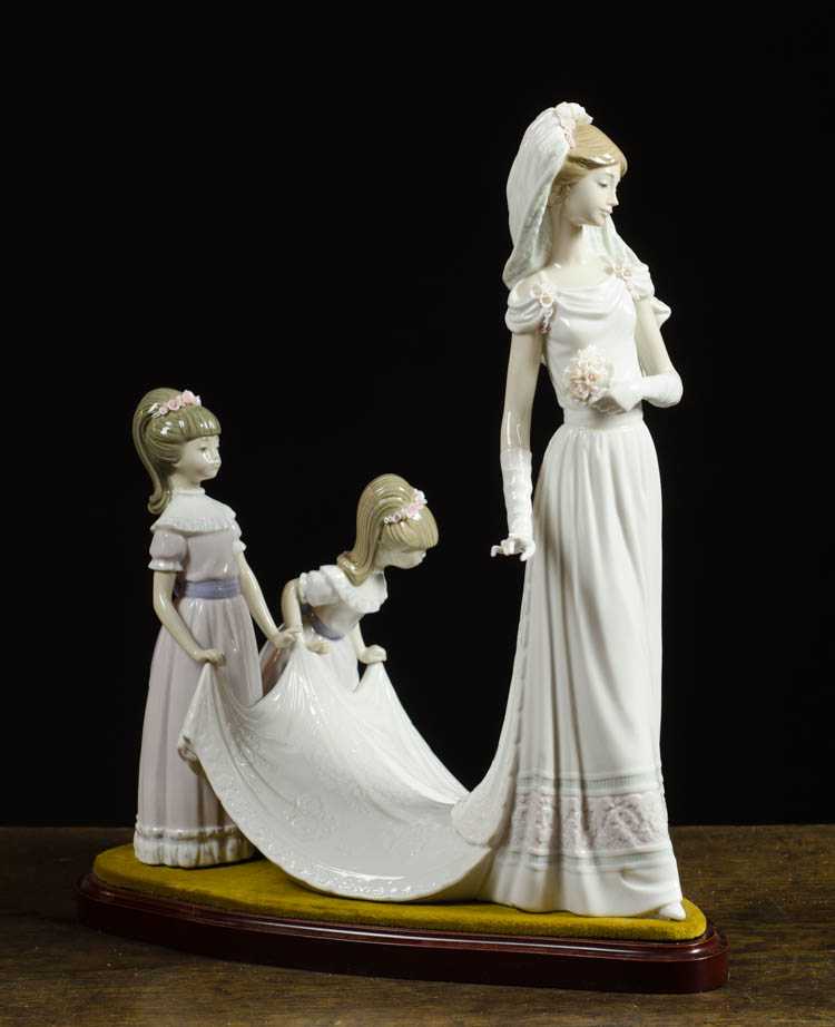 Appraisal: LLADRO HERE COMES THE BRIDE PORCELAIN SCULPTURE by Jose Puche