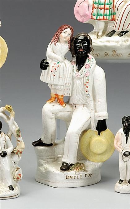 Appraisal: Staffordshire polychromed figural group of Uncle Tom and Eva second