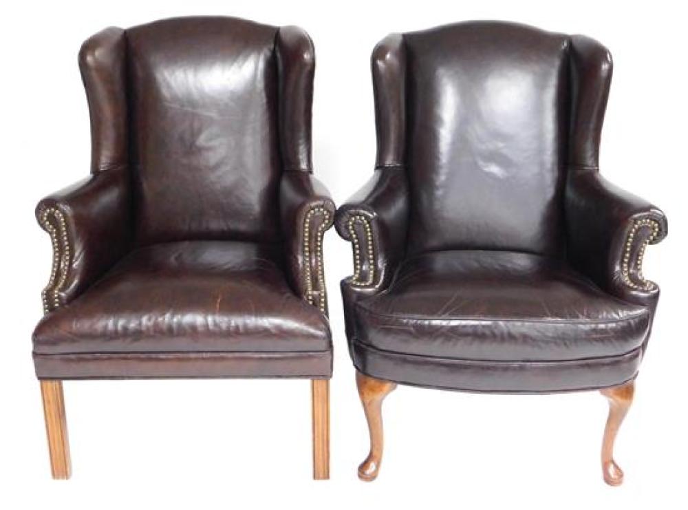 Appraisal: Brown leather armchairs assembled pair both with upholster wing back