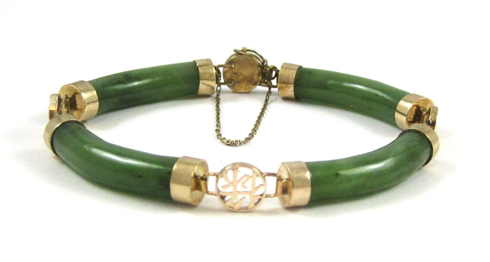 Appraisal: CHINESE JADE AND FOURTEEN KARAT GOLD BRACELET measuring - inches