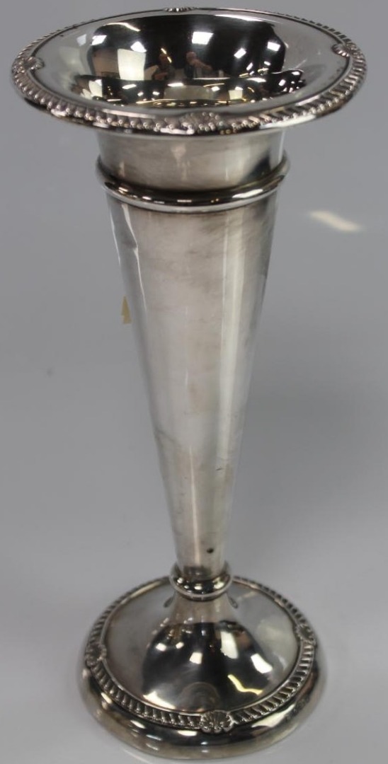 Appraisal: A George V silver trumpet vase with shell and gadrooned