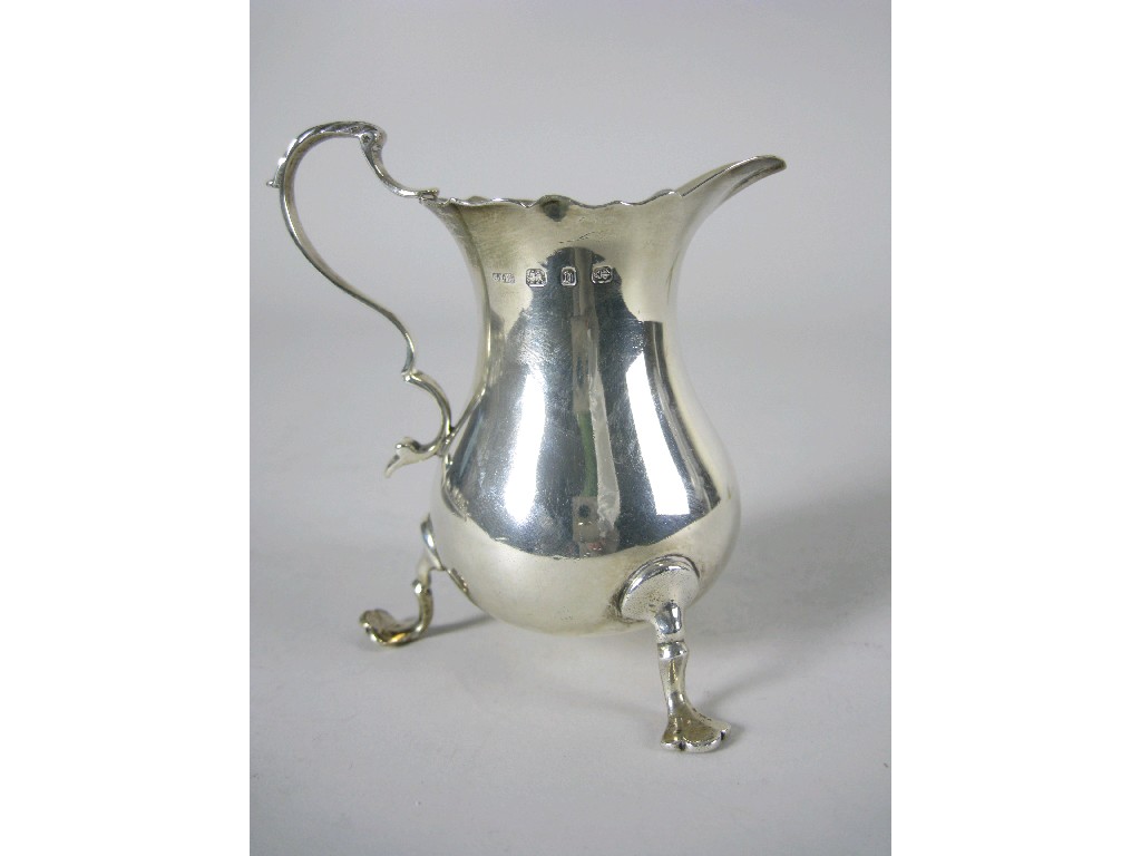 Appraisal: A Victorian Cream Jug and Sugar Bowl with shaped rims