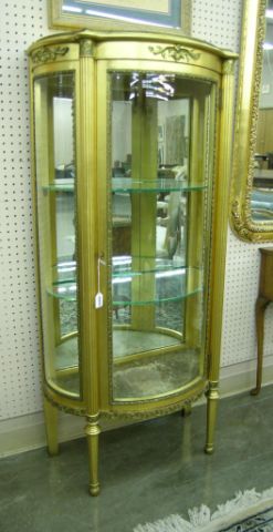 Appraisal: Louis XVI-style curved glass curio cabinet with glass shelves and