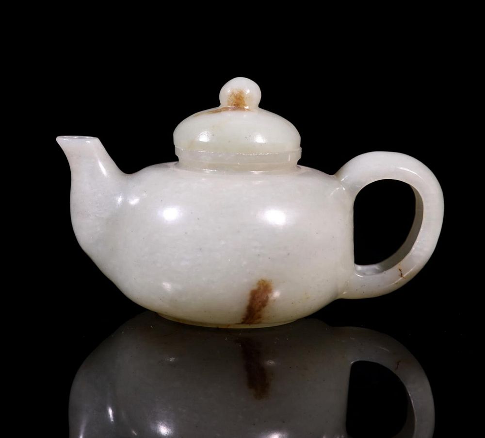 Appraisal: CHINESE CARVED WHITE JADE COVERED TEAPOT Fine Chinese carved white