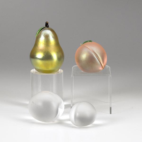 Appraisal: ORIENT FLUME Pear and peach form iridescent paperweights with applied