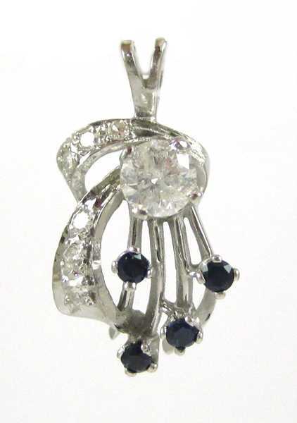 Appraisal: DIAMOND SAPPHIRE AND WHITE GOLD PENDANT The k white gold