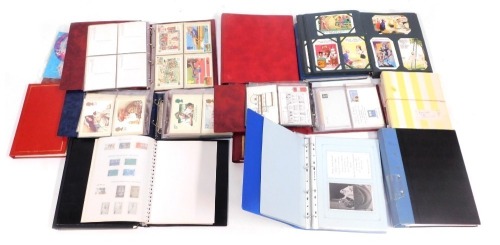 Appraisal: Postcards and first day covers comprising albums of first day