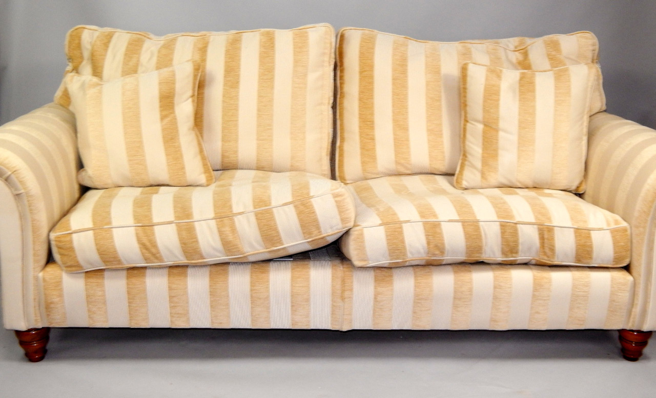 Appraisal: A Duresta modern three seater settee upholstered in beige stripe