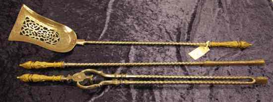 Appraisal: A set of three early Victorian steel and brass fire