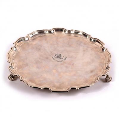 Appraisal: A silver salver Wakely Wheeler London on three scroll feet