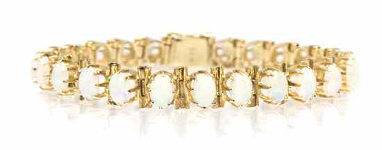 Appraisal: A Karat Yellow Gold and Opal Line Bracelet containing oval